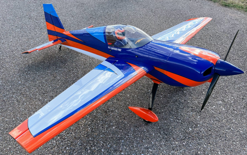 Extreme Flight - Slick 580 EXP 70" V2, White/Blue/Orange ARF Kit